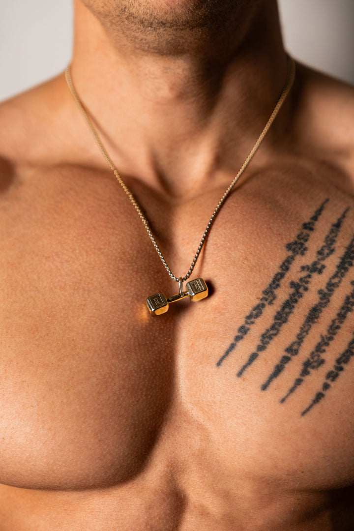 ALITE WEAR REP DOMINANCE gold dumbbell pendant necklace in 316L stainless steel