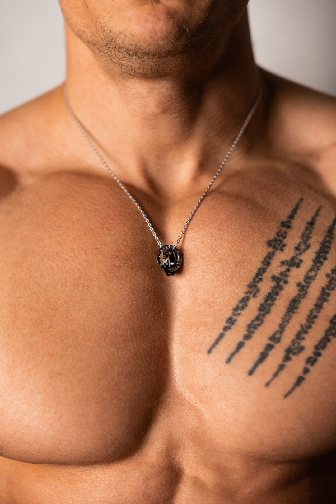 ALITE WEAR UNCHAINED silver round pendant necklace on a rope chain in 316L stainless steel