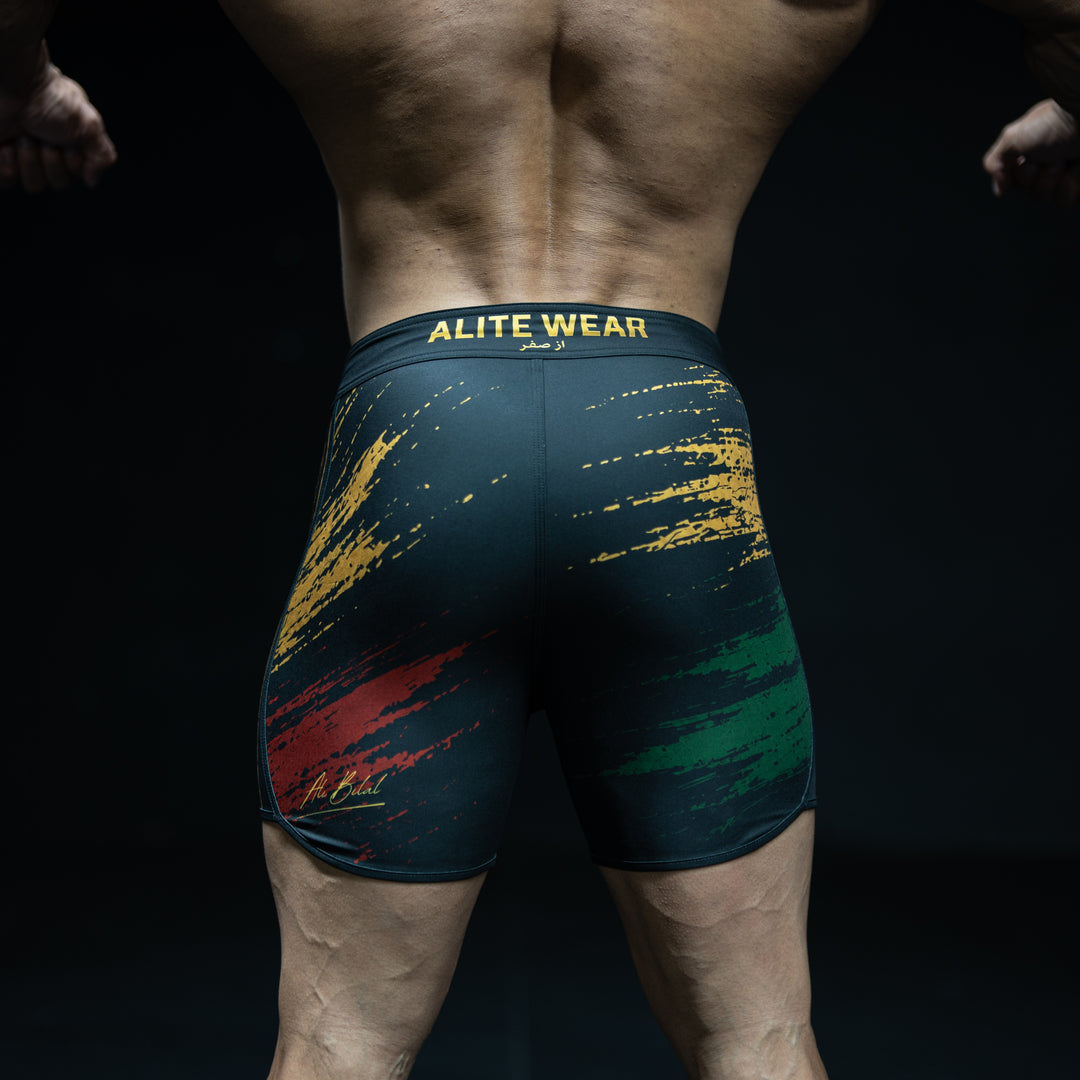 ALITE WEAR branded waistband rear view on Legacy black, gold, red, and green Men&