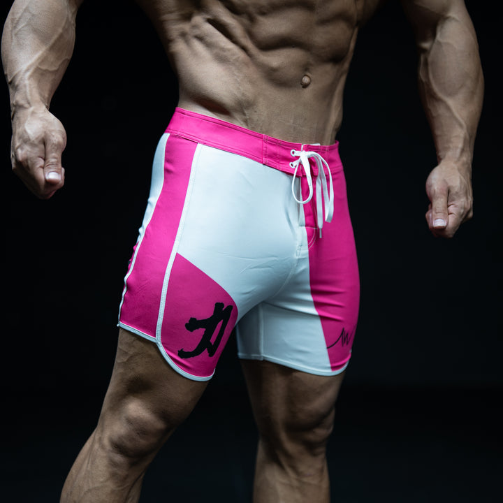 Muscular male athlete wearing Hanami pink and white Men&